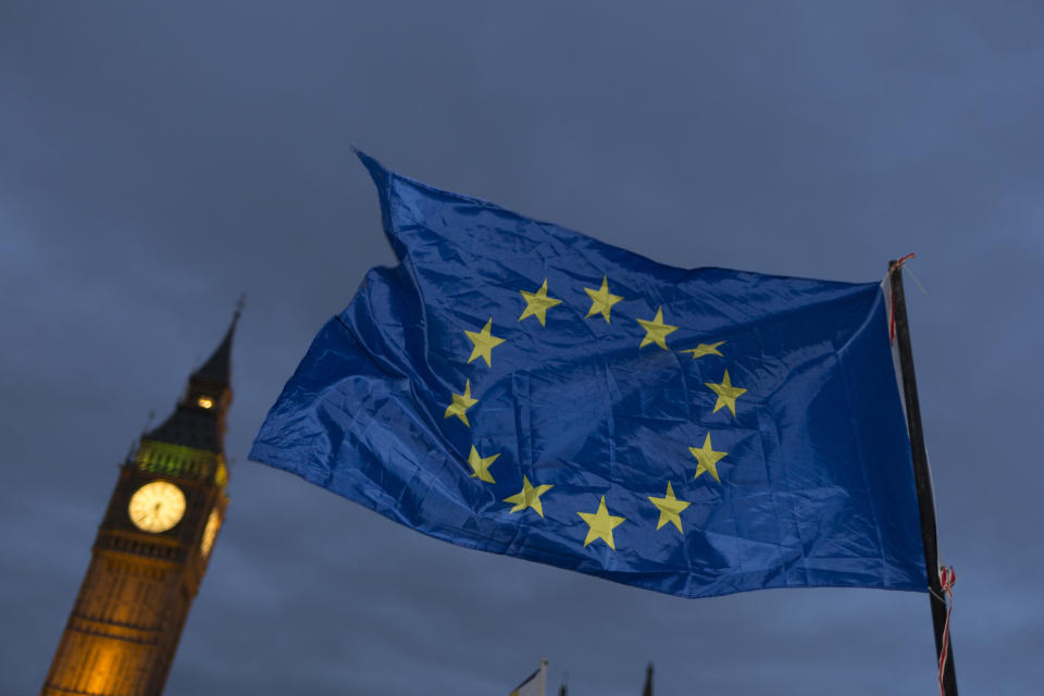 An EU flag is waved in front of the British parliament as the British government debated US President Donald Trump's state visit to the UK, thousands of protesters gathered in large numbers against the trip which would potentially cost millions of pounds in security alone, on February 20, 2017, in Parliament Square, London, UK.