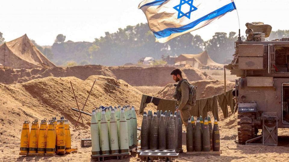 PHOTO: An Israeli soldier arranges artillery shells at a position near the border with the Gaza Strip in southern Israel on Nov. 6, 2023. (Jack Guez/AFP via Getty Images)