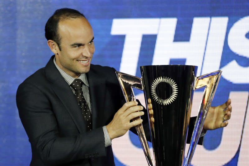 Landon Donovan brings the cup for the unveiling ceremony of the 2019 Gold Cup Groups and Schedule at the Banc of California Stadium in Los Angeles on April 10, 2019. The former soccer star turns 42 on March 4. File Photo by Etienne Laurent/EPA-EFE