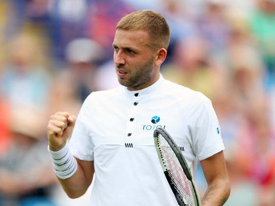 Dan Evans celebrates defeating Radu Albot (PA)