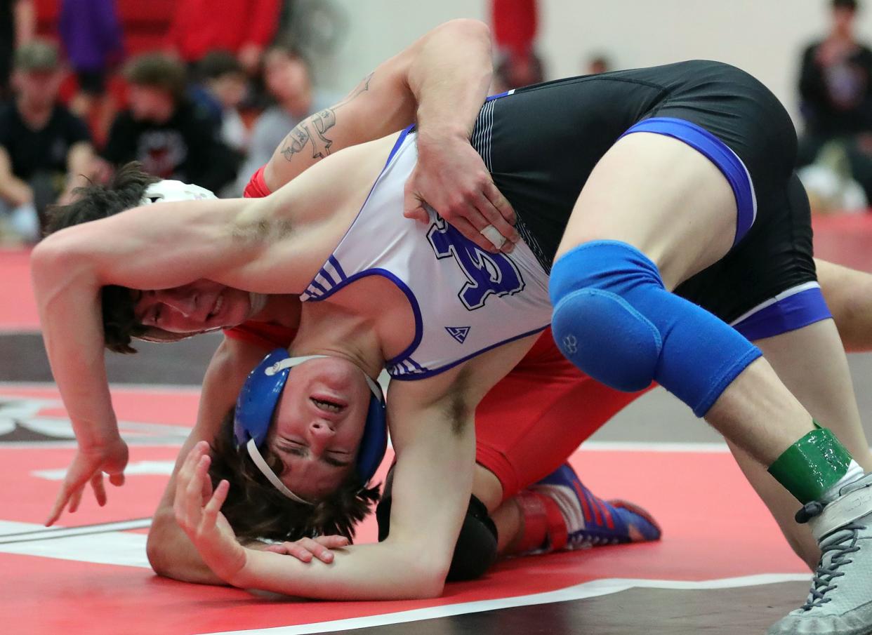 CVCA's Dylan Hart, bottom, wrestles Mentor's Diego Stropko in a 132-pound final of the Wadsworth Grizzly Invitational Tournament on Jan. 20 in Wadsworth.