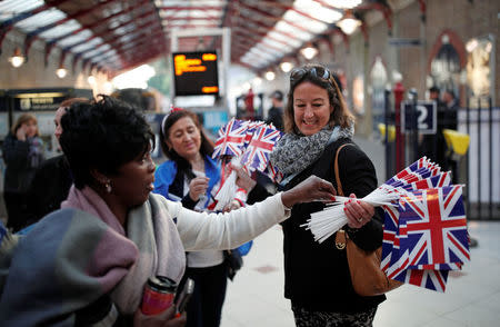 People arrive at the train station ahead of the wedding of Britain’s Prince Harry to Meghan Markle, in Windsor, Britain May 19, 2018. REUTERS/Benoit Tessier