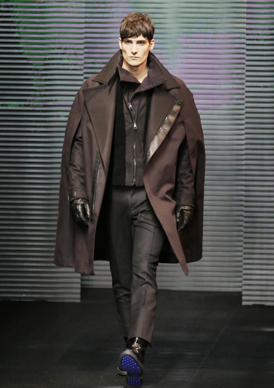 A model wears a creation for Salvatore Ferragamo men's Fall-Winter 2013-14 collection, part of the Milan Fashion Week, unveiled in Milan, Italy, Sunday, Jan. 13, 2013. (AP Photo/Antonio Calanni)