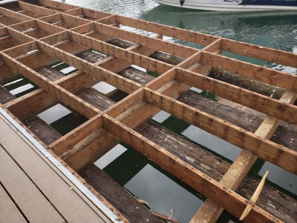 wooden house base of a floating home in the Columbia river in the pacific northwest