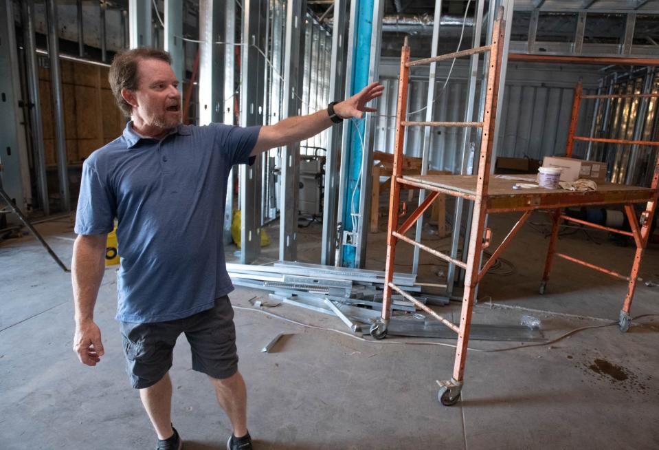 Owner Mike DeSorbo gives a tour of the Culinary Productions catering and event center under construction at 201 East Wright Street in downtown Pensacola on Monday, July 17, 2023.