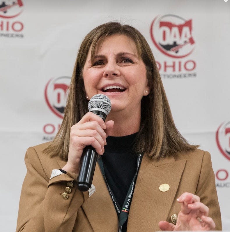 Theresa Blocher, an auctioneer and Realtor, has worked full time at family-owned, Canton-based Kiko since 1988. She is a third-generation family member to work for the business.