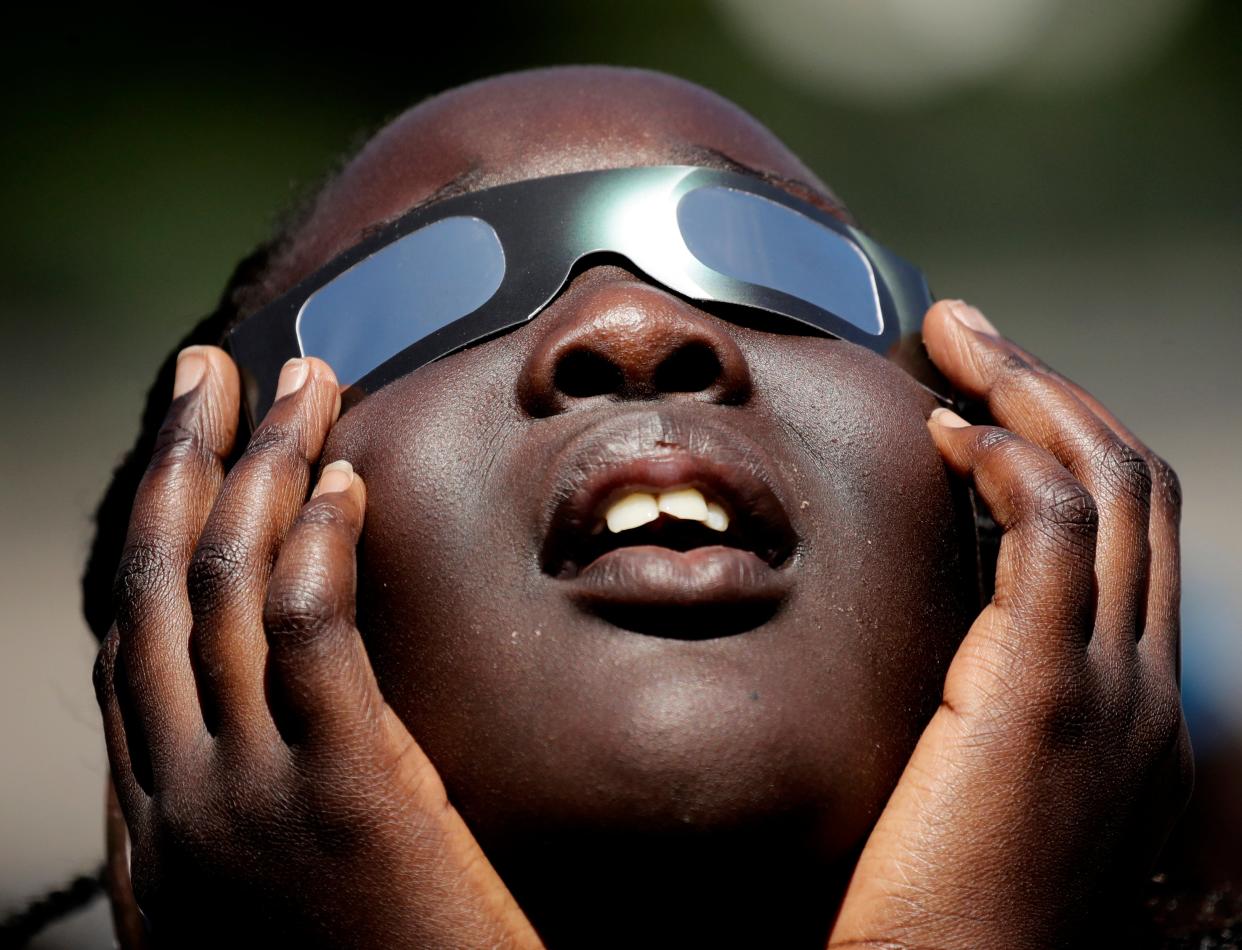 Solar eclipse glasses (The Associated Press)