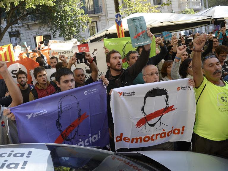 Spanish police storm Catalan government buildings to stop independence referendum