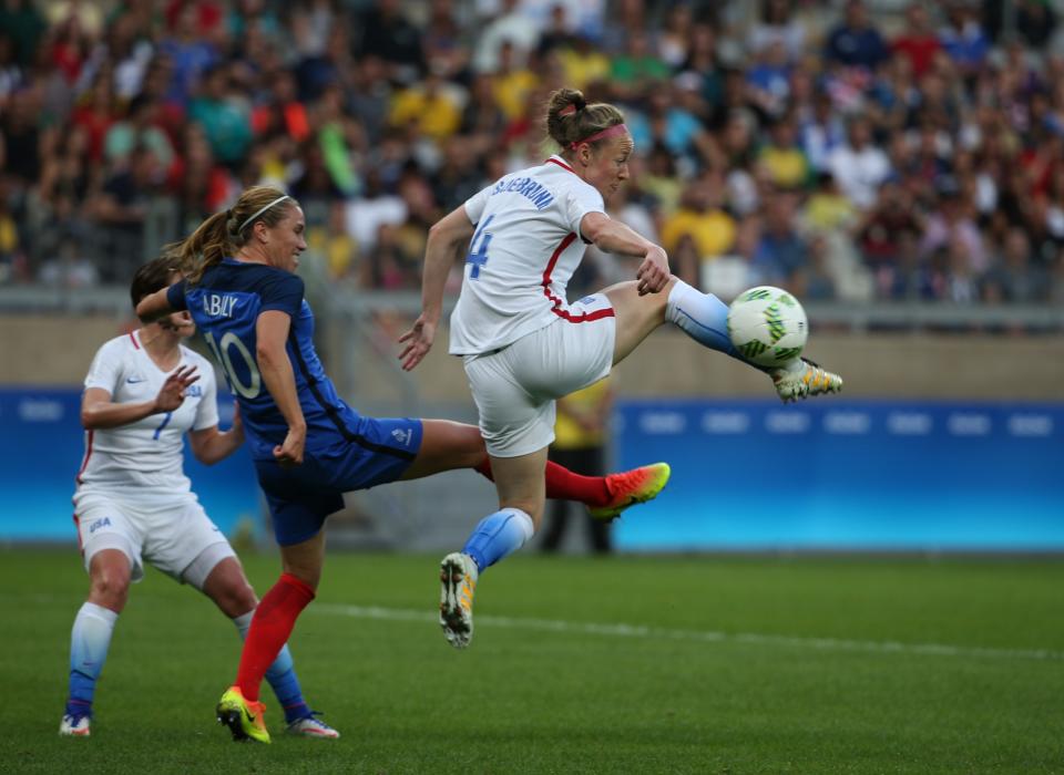 <p>United States’ Becky Sauerbrunn, right, fights for the ball with France’s Camille Abily during a group G match of the women’s Olympic football tournament between United States and France at the Mineirao stadium in Belo Horizonte, Brazil, Saturday, Aug. 6, 2016. (AP Photo/Eugenio Savio) </p>