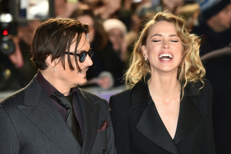 Johnny Depp (L) and Amber Heard (R) met on the set of the 2011 film "The Rum Diary," when Depp was still in a relationship with the French actress Vanessa Paradis, mother of his son Jack and daughter Lily-Rose