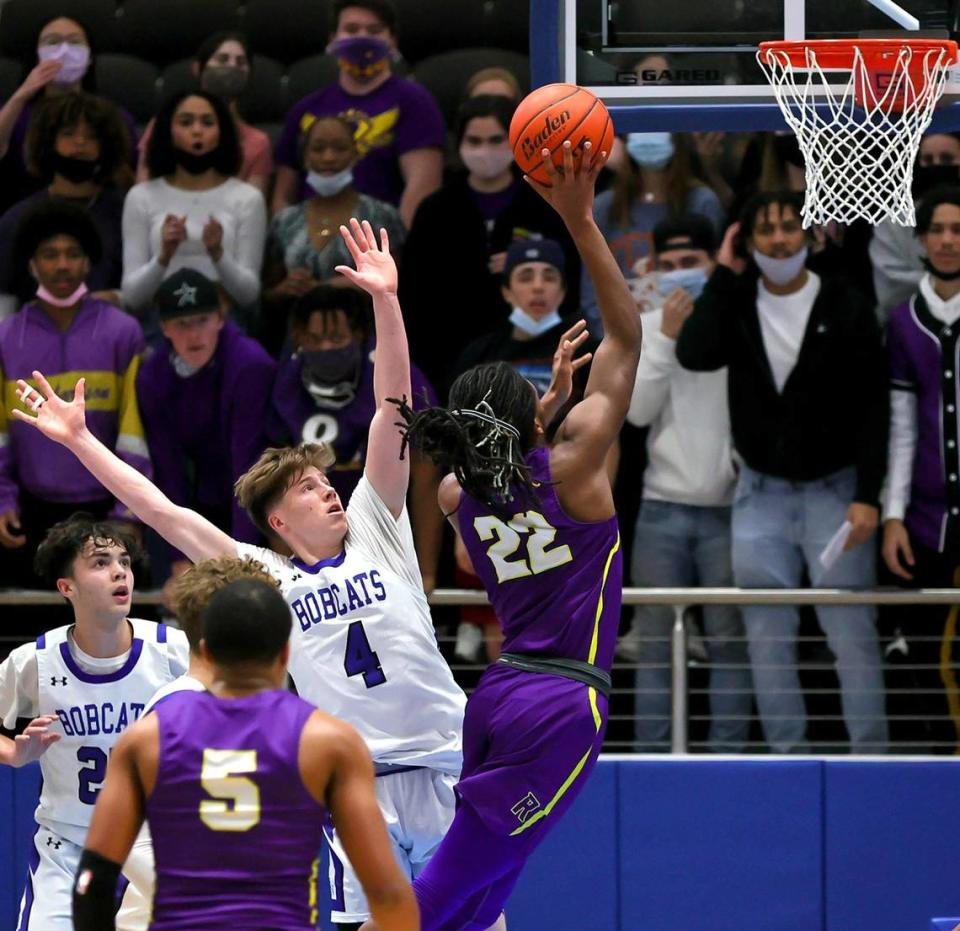 Richardson guard Cason Wallace (22) gets off a shot past Byron Nelson guard Kaden Morgan (4) during the first half of a 6A Region I Regional Semifinal Boys Basketball playoff game played on March 2, 2021 at Rock Hill High School in Frisco, TX. (Steve Nurenberg Special to the Star-Telegram)