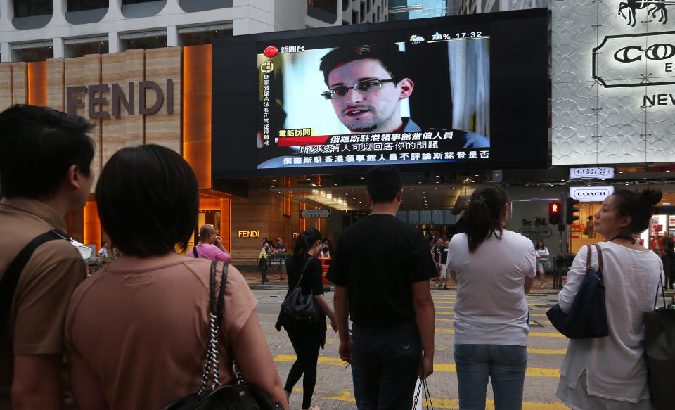 U.S. whistle-blower Edward Snowden is displayed on a giant screen during a local news program in Hong Kong, China on June 23, 2013. The Hong Kong government has confirmed that Edward Snowden has left Hong Kong and is on a commercial flight to Russia. (Sam Tsang/South China Morning Post via Getty Images)