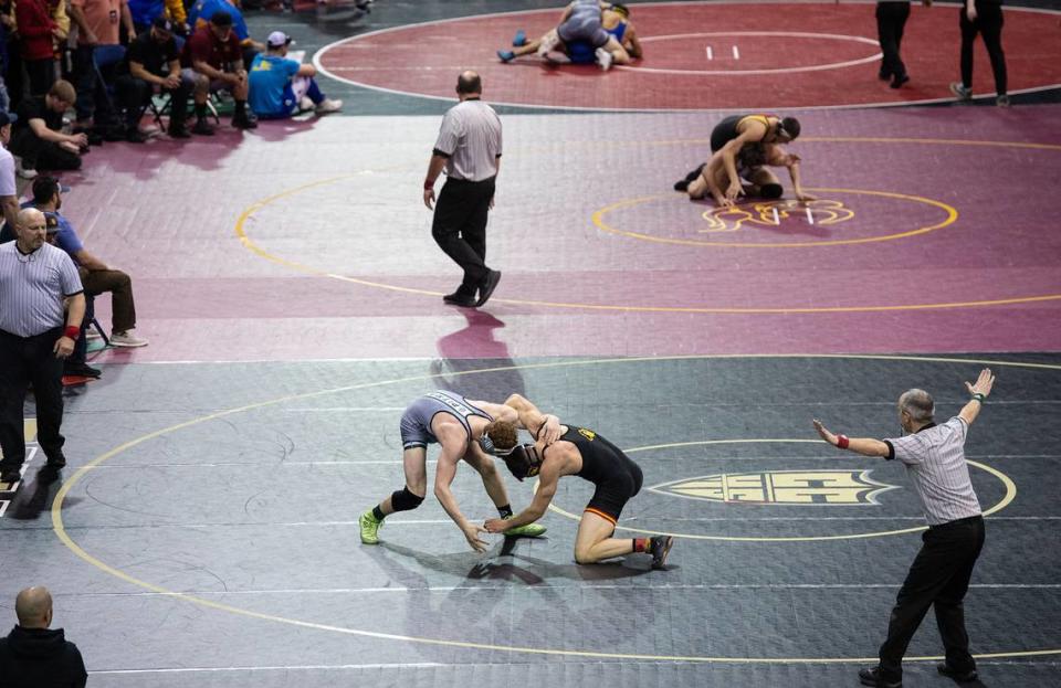 Oakdale’s Payne Perkins and Carter Vannest of Pitman wrestle in the 160-pound 3rd place match during the Sac-Joaquin Section Masters wrestling championships at Stockton Arena in Stockton, Calif., Saturday, Feb. 18, 2023. Perkins won with a pin at 2:06.