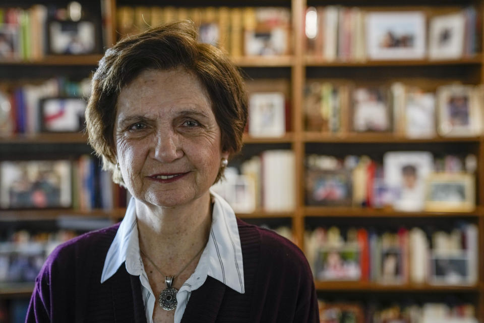 María Luisa Sepúlveda, who was a Vicariate of Solidarity social worker, poses for a picture in her home in Santiago, Friday, Aug. 25, 2023. On certain days, her job involved heading to the morgue. She saw corpses whose faces and fingertips were ripped off to avoid identification; pregnant women whose abdomens were severed. The worst, Sepúlveda said, was the uncertainty among the families. “People were totally disoriented by the unprecedented situations,” she said. (AP Photo/Esteban Felix)