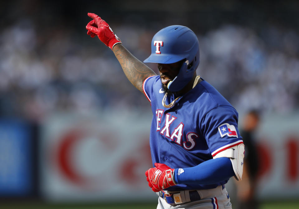 Texas Rangers' Adolis Garcia reacts after hitting a single against the New York Yankees during the sixth inning of a baseball game, Saturday, June 24, 2023, in New York. (AP Photo/Noah K. Murray)