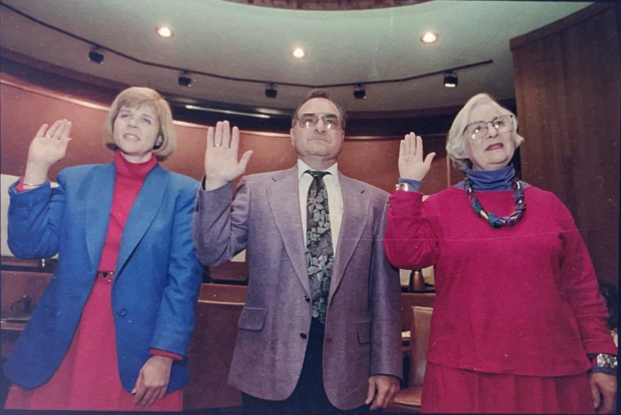 Laurel Barton, left, Basil Perch and Mary Louise Vivier take the oath of office in November of 1993.