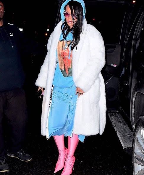 <p>In a blue ensemble, pink Balenciaga boots, and a white Alexander Wang mink robe while out in NYC.</p>