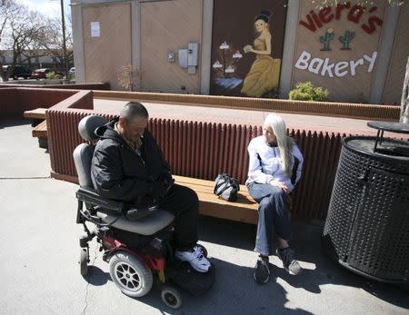 Gilbert Sifuentes and Janet Lay visit Peanut Park in Pasco, Washington March 21, 2015. REUTERS/Ross Courtney