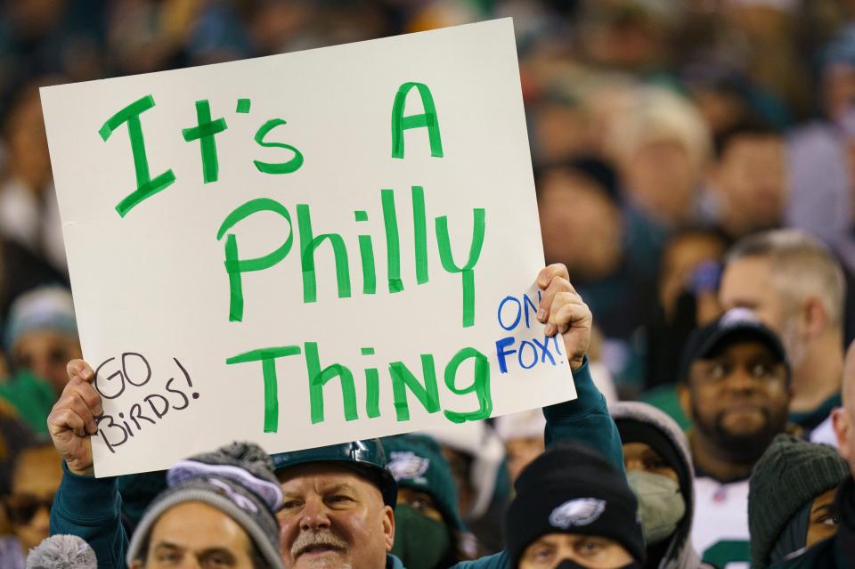 Philadelphia Eagles fans with a sign "It's a Philly Thing" on it during the NFL divisional round playoff football game against the New York Giants, Saturday, Jan. 21, 2023, in Philadelphia.