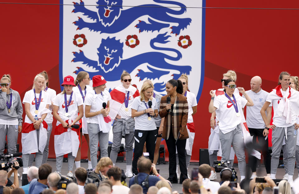 England head coach Sarina Wiegman speaks to presenter Alex Scott on stage during a fan celebration to commemorate England's historic UEFA Women's EURO 2022 triumph in Trafalgar Square, London. Picture date: Monday August 1, 2022.