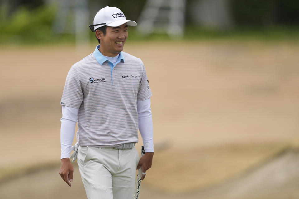 Michael Kim smiles on the second green on the Pete Dye Stadium Course at PGA West during the third round of The American Express golf tournament Saturday, Jan. 20, 2024, in La Quinta, Calif. (AP Photo/Ryan Sun)