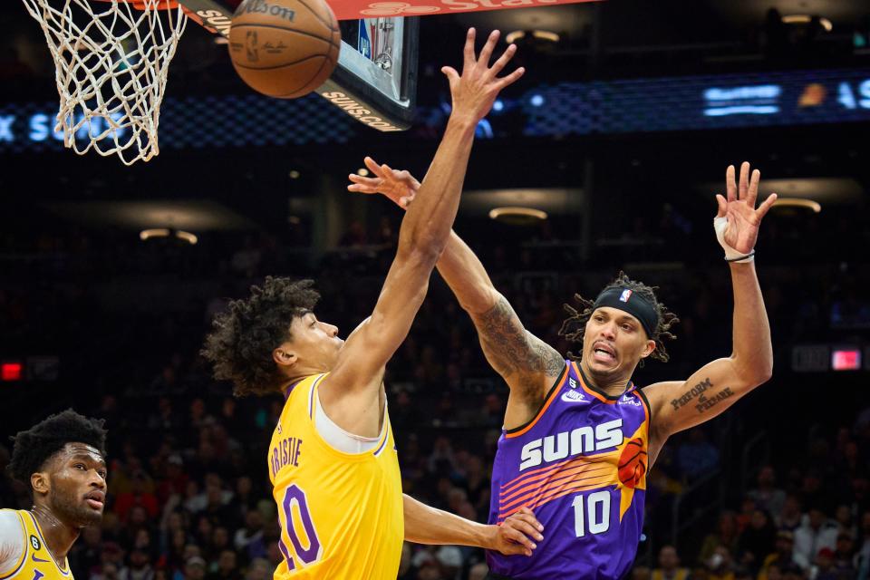 Dec 19, 2022; Phoenix, AZ, USA; Phoenix Suns guard Damion Lee (10) shoots as Los Angeles Lakers guard Max Christie (10) attempts to block the shot at Footprint Center on Monday, Dec. 19, 2022. Mandatory Credit: Alex Gould/The Republic