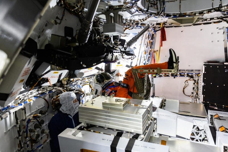 The Campos manikin being placed inside Orion on August 3, 2022. 