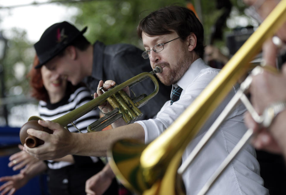 FILE - Bamm Gibson and the New Orleans Hot Jazz perform on the first day of the annual French Quarter Festival in New Orleans, April 11, 2013. Officials on Tuesday, Jan. 13, 2023, announced a lineup of more than 270 acts for New Orleans' 40th annual French Quarter Festival, billed as Louisiana's largest free showcase of music, food and culture. (AP Photo/Gerald Herbert, File)