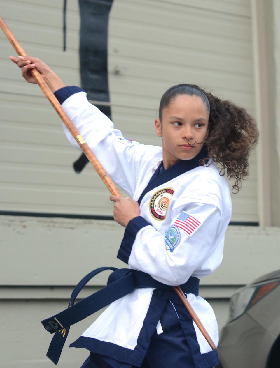 Aris Roane, 12, of Brooklyn, who recently won as the Tang Soo Do Grand Champion competing against adults with her bo staff at Quest Martial Arts in Thompson.