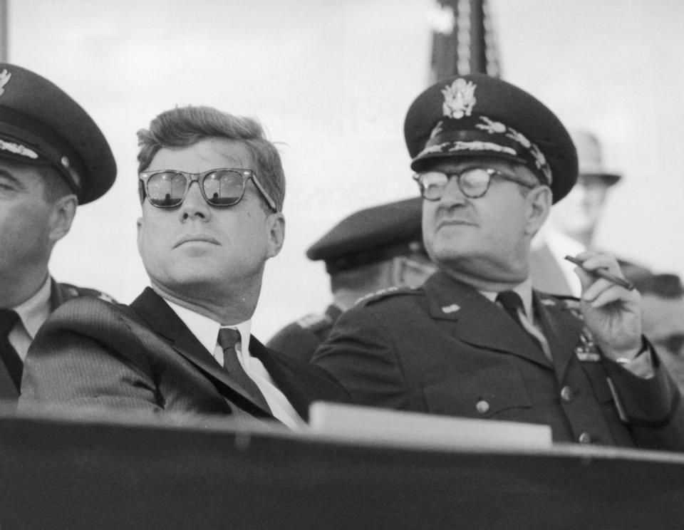 <p>JFK stumbles onto the set of a Ray-Ban advertisement and rolls with it like a pro. </p>