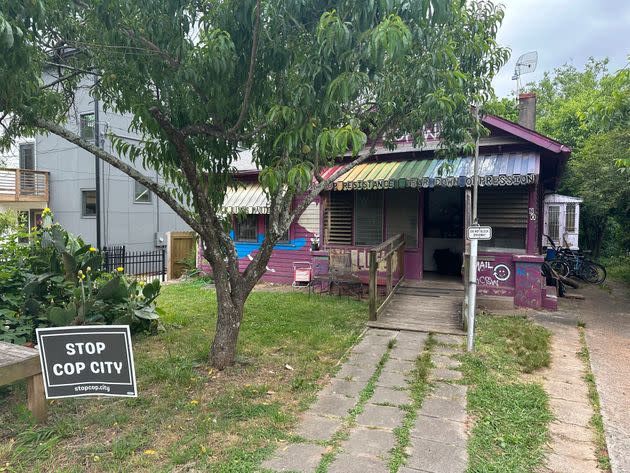 This is the house in Atlanta's Edgewood neighborhood where on Wednesday police arrested three key organizers who have been aiding protesters fighting the city's proposed public safety training center. The three are officers of the group that runs the Atlanta Solidarity Fund, which has bailed out people arrested at protests.