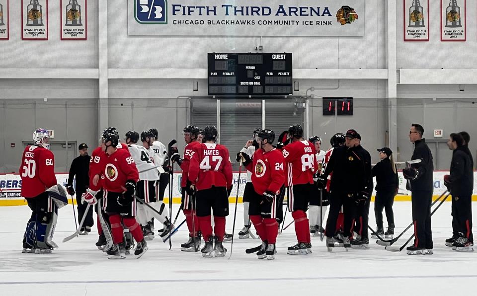 A group of players break from a huddle during the Chicago Blackhawks Development Camp in Chicago on Tuesday, July 12, 2022.