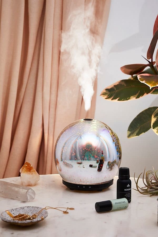 Get it <a href="https://www.urbanoutfitters.com/shop/3d-led-gala-essential-oil-diffuser?category=valentines-day-party-decor&amp;color=095" target="_blank">here</a>.