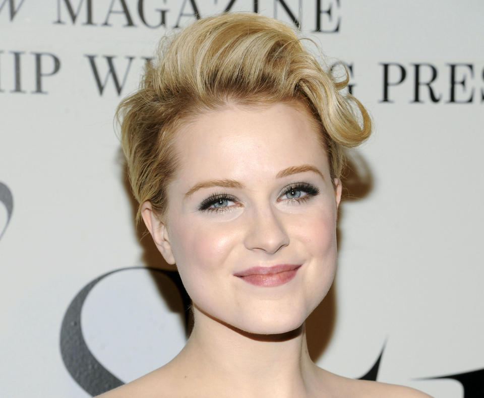 FILE - This Feb. 14, 2012 file photo shows actress Evan Rachel Wood at the unveiling of "The Ever Changing Face of Beauty" video installation by fashion photographer Solve Sundsbo at the Park Avenue Armory in New York. Her representative said Monday that she gave birth to a baby boy. The 25-year-old actress is married to British actor Jamie Bell. They were married last year (AP Photo/Evan Agostini, file)