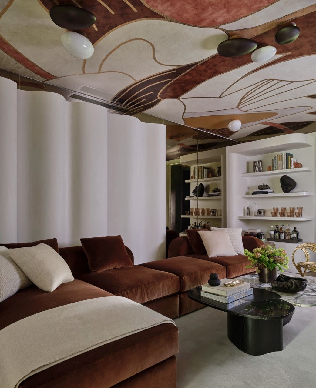 a living room with a ceiling fan