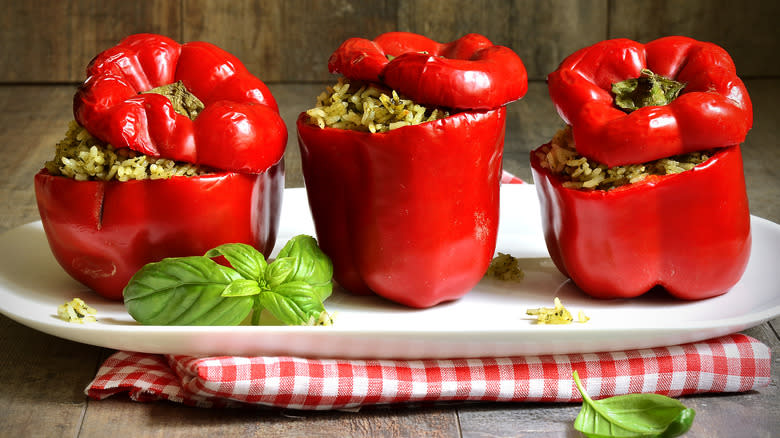 three red stuffed peppers