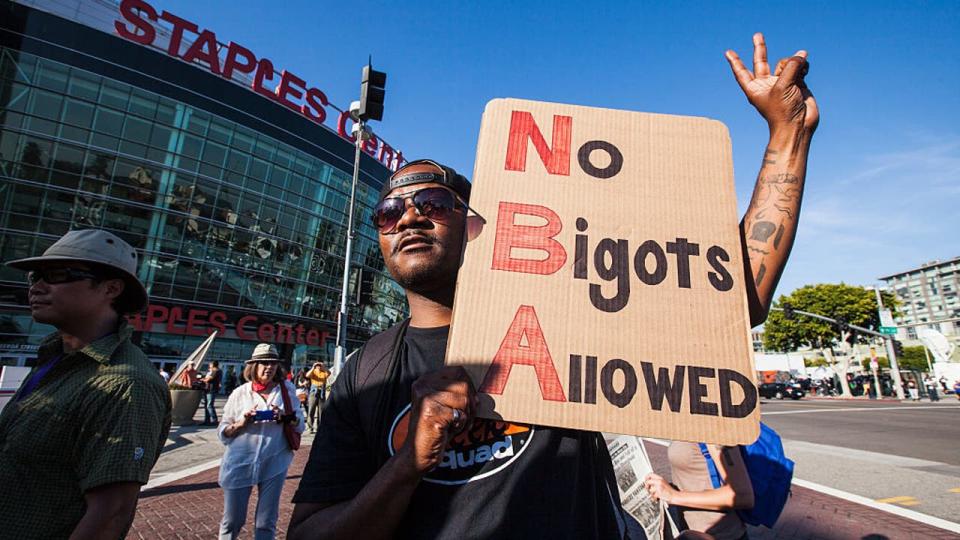 <div>A demonstration against LA Clipper team owner, Donald Sterling, outside of the Staples Center. Earlier in the day, the NBA commissioner decided to oust Donald Sterling as owner of the LA Clippers. (Photo by Ted Soqui/Corbis via Getty Images)</div>