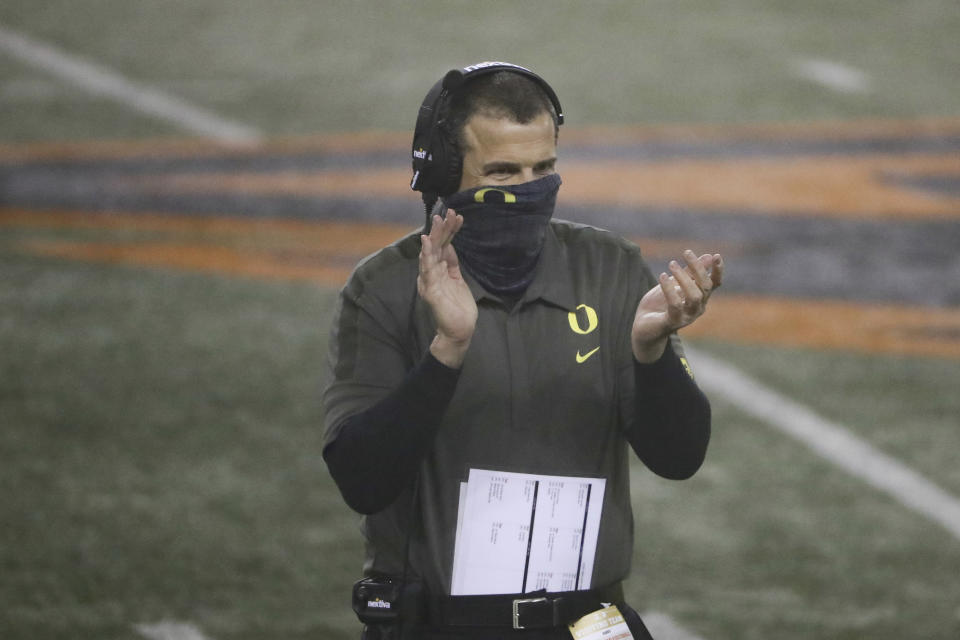 Oregon coach Mario Cristobal celebrates an Oregon touchdown during the first half of an NCAA college football game against Oregon State in Corvallis, Ore., Friday, Nov. 27, 2020. (AP Photo/Amanda Loman)