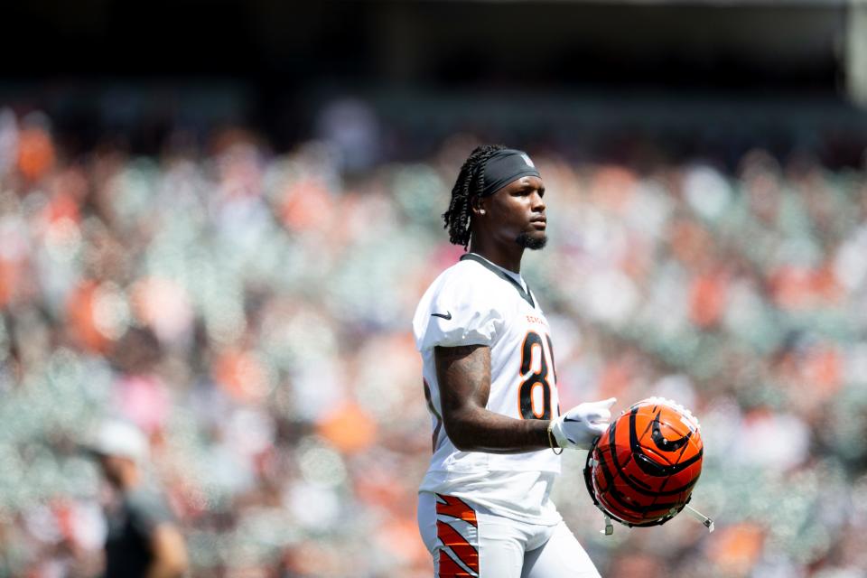 Cincinnati Bengals wide receiver Tee Higgins (85) walks with his helmet off during Cincinnati Bengals preseason training camp at Paul Brown Stadium in Cincinnati on Saturday, July 30, 2022.