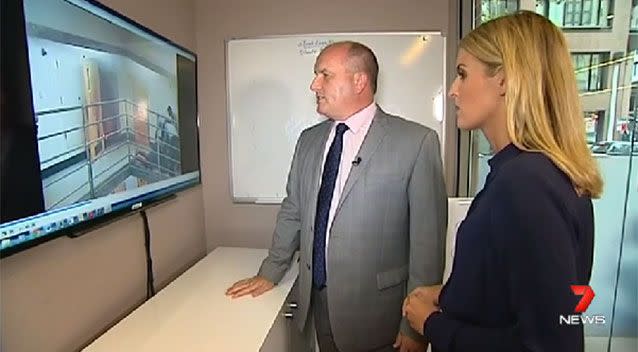 Corrections Minister David Elliott views footage of the prison confrontation with 7 News reporter Ashlee Mullany. Photo: 7 News