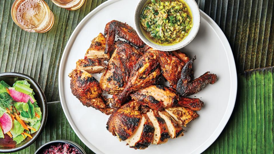A ginger-scallion-lemongrass sauce adds a whole new dimension to the blank summer canvas that is <a href="https://www.bonappetit.com/recipes/chicken/slideshow/grilled-chicken-recipes?mbid=synd_yahoo_rss" rel="nofollow noopener" target="_blank" data-ylk="slk:grilled chicken;elm:context_link;itc:0" class="link ">grilled chicken</a>. <a href="https://www.bonappetit.com/recipe/grilled-butterflied-chicken-with-lemongrass-sauce?mbid=synd_yahoo_rss" rel="nofollow noopener" target="_blank" data-ylk="slk:See recipe.;elm:context_link;itc:0" class="link ">See recipe.</a>