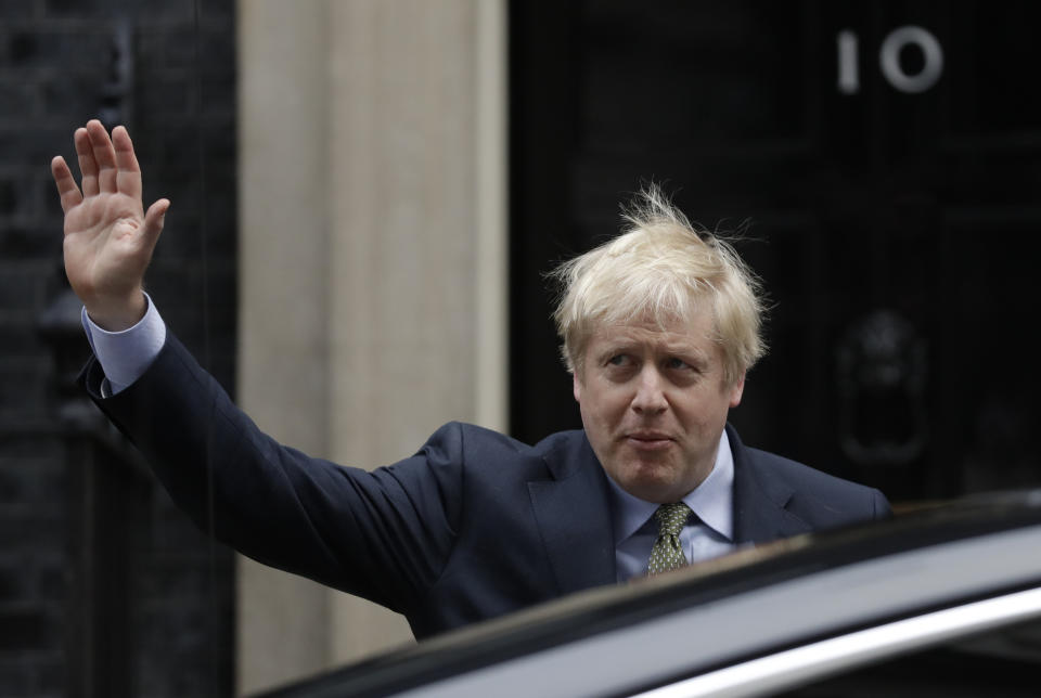 Britain's Prime Minister Boris Johnson leaves 10 Downing Street to travel to Buckingham Palace, London, to meet with Queen Elizabeth II on Friday, Dec. 13, 2019. Prime Minister Boris Johnson's Conservative Party has won a solid majority of seats in Britain's Parliament — a decisive outcome to a Brexit-dominated election that should allow Johnson to fulfil his plan to take the U.K. out of the European Union next month. (AP Photo/Matt Dunham)