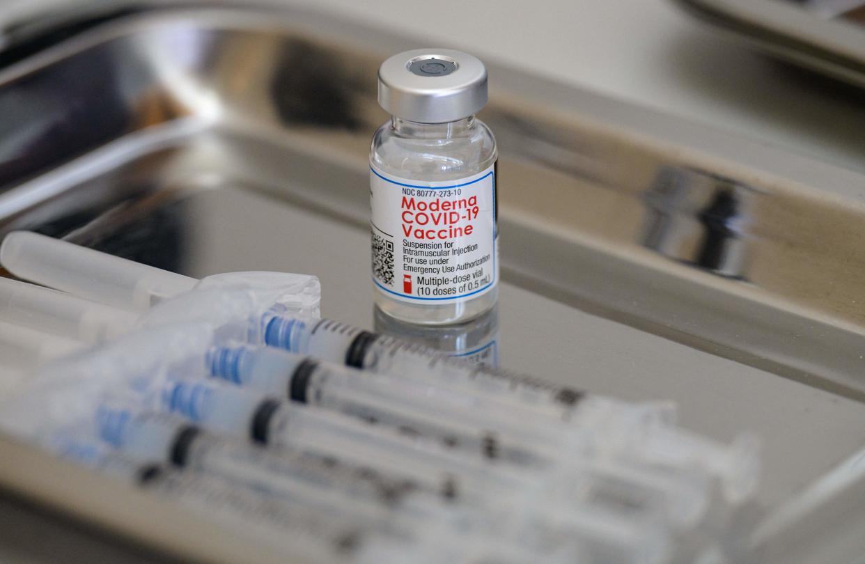 A vial of the Moderna Covid-19 vaccine and syringes sit prepared at a pop up vaccine clinic at the Jewish Community Center on April 16, 2021 in the Staten Island borough of New York City. (Photo by Angela Weiss / AFP) (Photo by ANGELA WEISS/AFP via Getty Images)