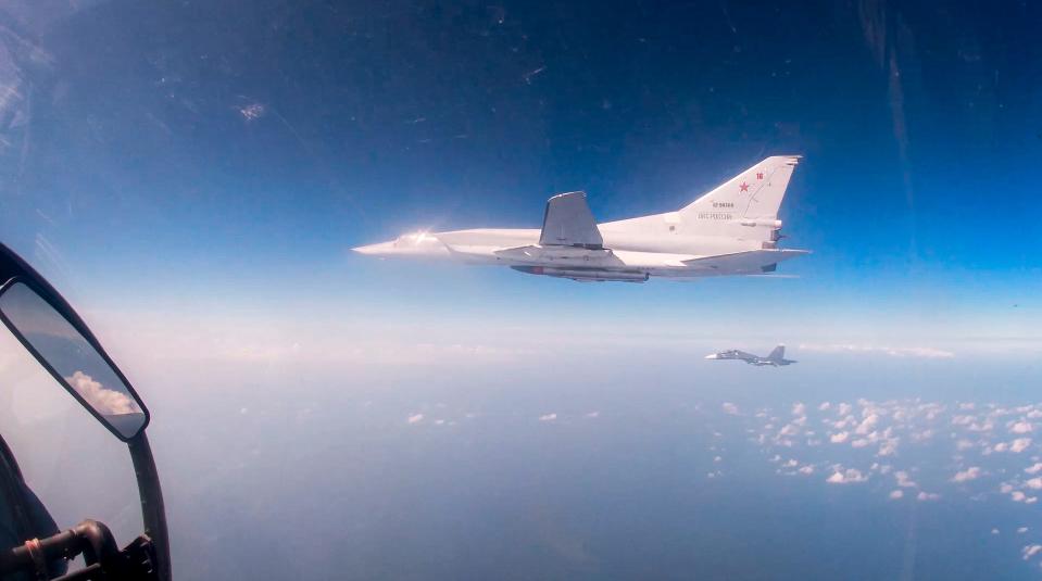 A Tu-22M3 bomber of the Russian air forces flies over the Mediterranean after taking off from the Hemeimeem Air Base in Syria, on Feb. 19, 2022.