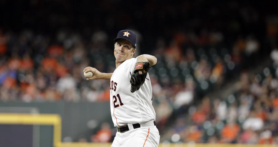 Houston Astros' starting pitcher Zack Greinke (21) throws against the Oakland Athletics during the first inning of a baseball game Monday, Sept. 9, 2019, in Houston. (AP Photo/David J. Phillip)