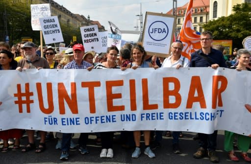 Under the banner "indivisible", a broad coalition of artists, unionists and politicians gathered in Dresden