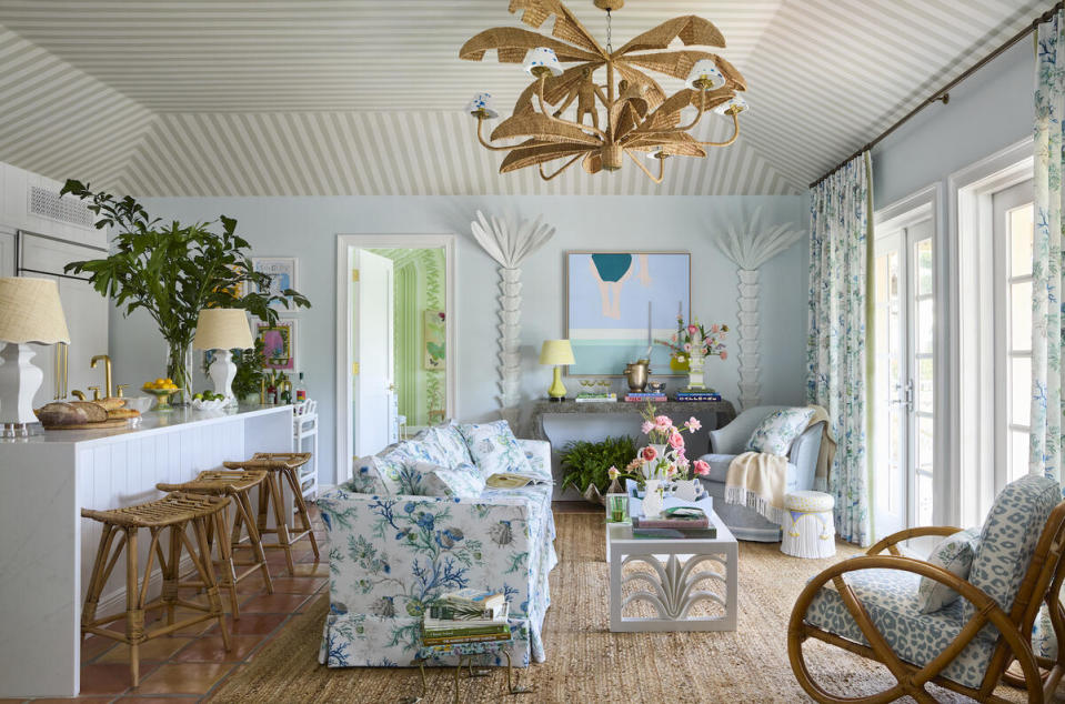 The living room inside the Chairish Villa at The Colony Palm Beach, including the Monkey Couple chandelier by Mario Lopez Torres