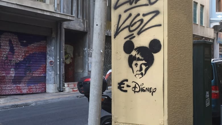 Athens graffiti illustrate outrage at economic plight