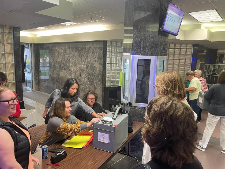 Minnehaha County election workers collect ballots from polling locations on Tuesday, June 7, 2022, in Sioux Falls.