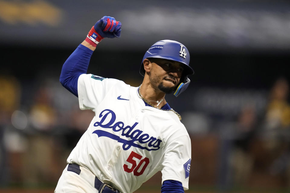 Los Angeles Dodgers' Mookie Betts gestures after hitting a two run home run during the fifth inning of a baseball game against the San Diego Padres at the Gocheok Sky Dome in Seoul, South Korea Thursday, March 21, 2024, in Seoul, South Korea. (AP Photo/Lee Jin-man)